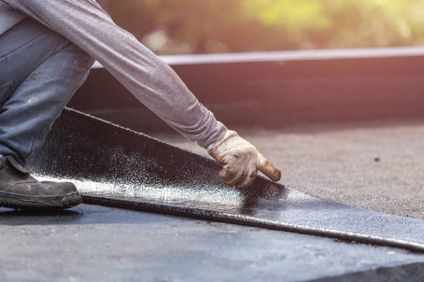Professional Basement Waterproofing technician working in Kennard, IN